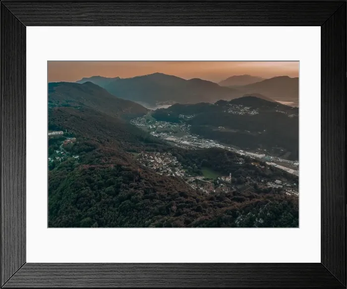 Framed Print : Aerial drone shot sunset view of Monte Salvatore, Swiss village Carabbia, Carabietta, agara Ti, Grancia Barbengo Framed Print : Aerial drone shot sunset view of Monte Salvatore, Swiss village Carabbia, Carabietta, agara Ti, Grancia Barbengo