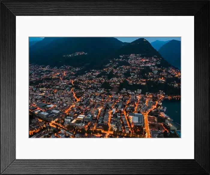 Framed Print : High angle aerial drone night shot of city street lights by lake monte salvatore in Lugano, Switzerland Framed Print : High angle aerial drone night shot of city street lights by lake monte salvatore in Lugano, Switzerland
