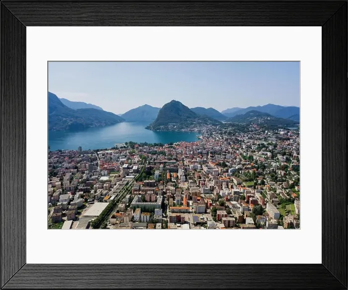 Framed Print : Aerial drone shot of monte salvatore, lugano city and lake in sunny day Framed Print : Aerial drone shot of monte salvatore, lugano city and lake in sunny day
