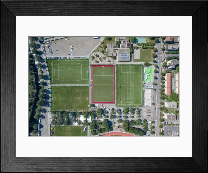 Framed Print : Overhead aerial drone shot view of football fields in Lugano city, Switzerland Framed Print : Overhead aerial drone shot view of football fields in Lugano city, Switzerland