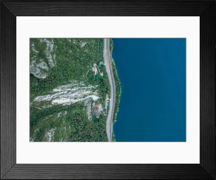 Framed Print : Overhead aerial drone shot lakeside road between Monte Salvatore and Lugano Lake Framed Print : Overhead aerial drone shot lakeside road between Monte Salvatore and Lugano Lake