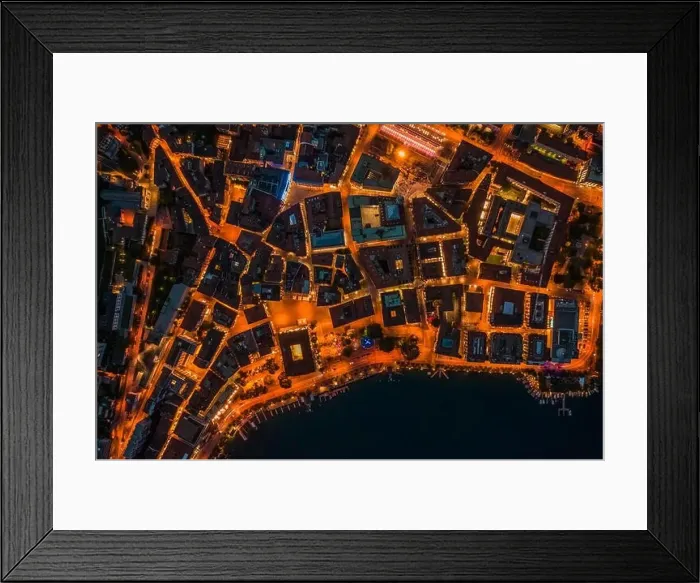 Framed Print : Overhead aerial drone night shot of city street lights in Lugano, Switzerland Framed Print : Overhead aerial drone night shot of city street lights in Lugano, Switzerland