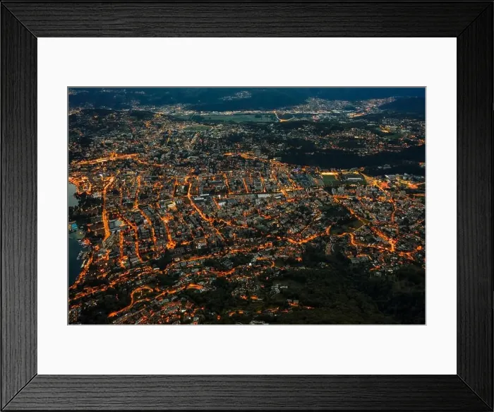 Framed Print : High angle aerial drone shot view Lugano by lake with city street lights after sunset in Switzerland Framed Print : High angle aerial drone shot view Lugano by lake with city street lights after sunset in Switzerland