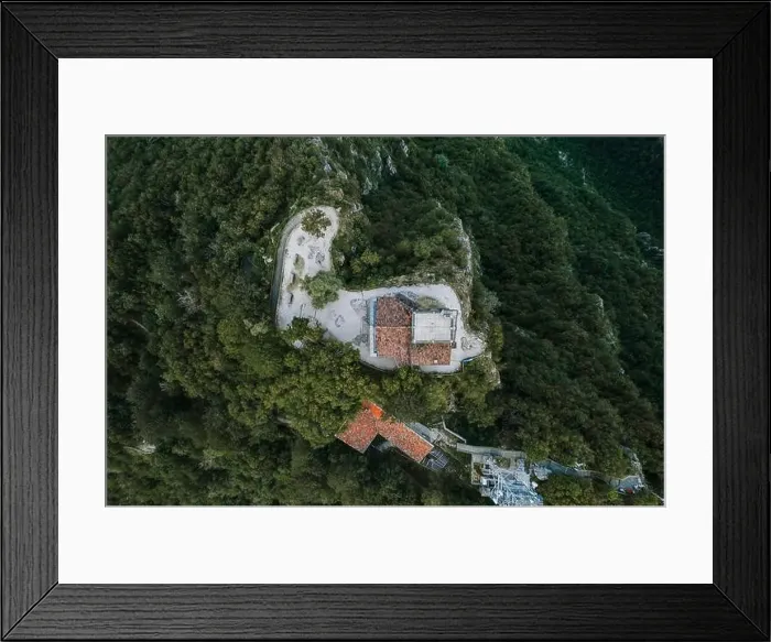 Framed Print : Overhead aerial drone shot view of top of monte salvatore with chapel and observatory in Lugano, Switzerland Framed Print : Overhead aerial drone shot view of top of monte salvatore with chapel and observatory in Lugano, Switzerland