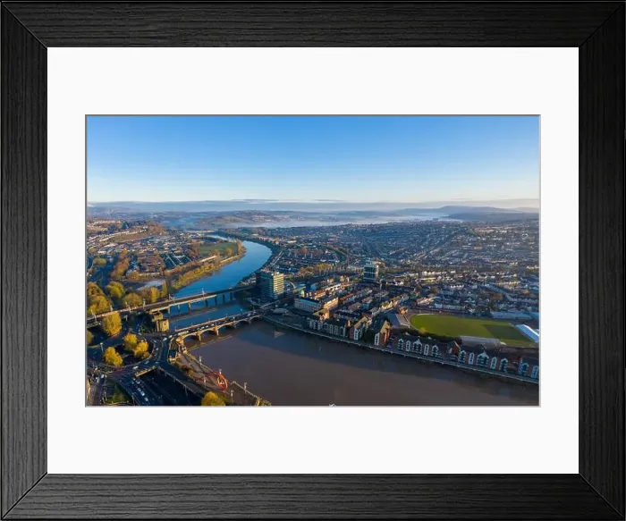 Framed Print : An aerial view at sunrise of Newport city centre, south wales United Kingdom, taken from the River Usk Framed Print : An aerial view at sunrise of Newport city centre, south wales United Kingdom, taken from the River Usk