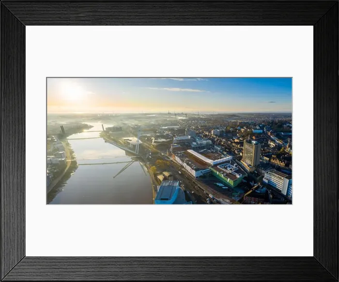 Framed Print : An aerial view at sunrise of Newport city centre, south wales United Kingdom, taken from the River Usk Framed Print : An aerial view at sunrise of Newport city centre, south wales United Kingdom, taken from the River Usk