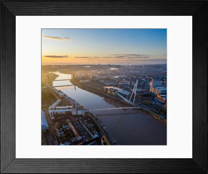 Framed Print : An aerial view at sunrise of Newport city centre, south wales United Kingdom, taken from the River Usk Framed Print : An aerial view at sunrise of Newport city centre, south wales United Kingdom, taken from the River Usk