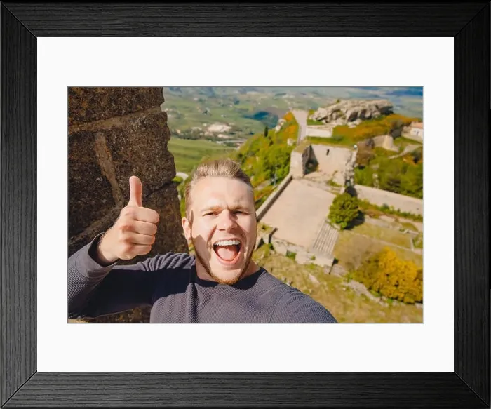 Framed Print : Selfie photo traveler man smiling Castello di lombardia in Enna Sicily, Italy Framed Print : Selfie photo traveler man smiling Castello di lombardia in Enna Sicily, Italy