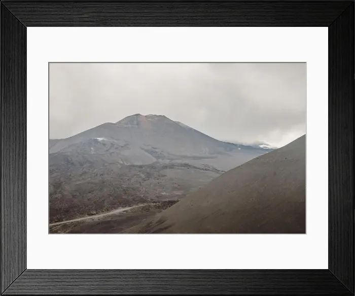 Framed Print : Top of crater Mount Etna volcano, frozen cold lava smokes, thick clouds Framed Print : Top of crater Mount Etna volcano, frozen cold lava smokes, thick clouds