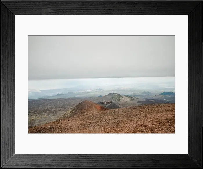 Framed Print : Top of crater Mount Etna volcano, frozen cold lava smokes, thick clouds Framed Print : Top of crater Mount Etna volcano, frozen cold lava smokes, thick clouds