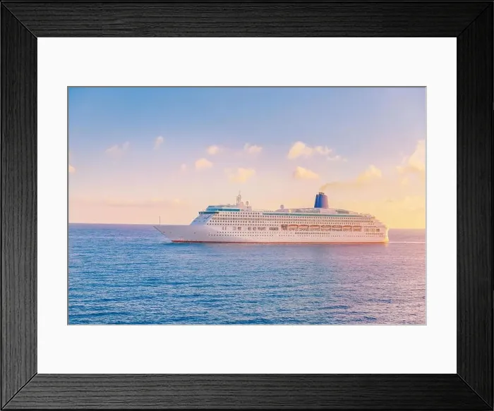 Framed Print : Luxury cruise ship leaves port sunset in blue sea with clouds Framed Print : Luxury cruise ship leaves port sunset in blue sea with clouds