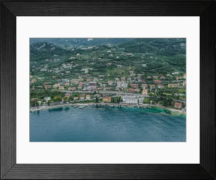 Framed Print : Aerial drone shot view of village Malcesine coastline by lake garda Framed Print : Aerial drone shot view of village Malcesine coastline by lake garda