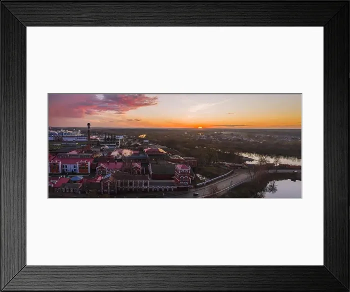 Framed Print : Panorama with a view from above on an industrial area with a paper mill at sunset in late autumn Framed Print : Panorama with a view from above on an industrial area with a paper mill at sunset in late autumn