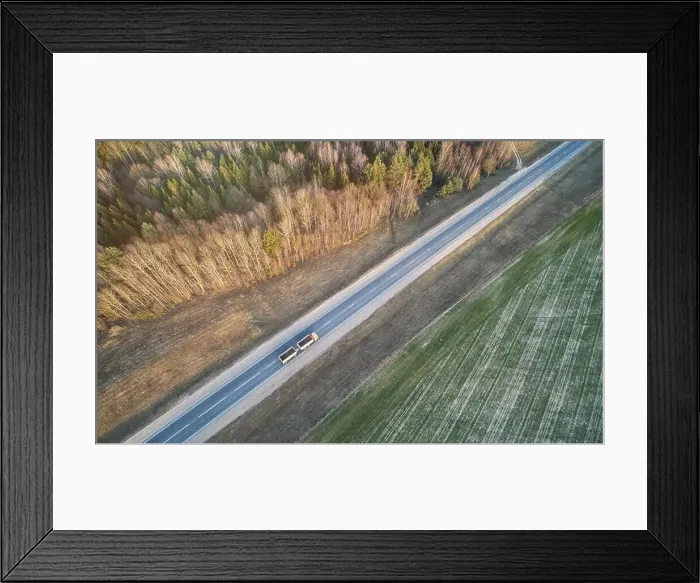Framed Print : Truck carry heavy load on road aerial above drone view Framed Print : Truck carry heavy load on road aerial above drone view