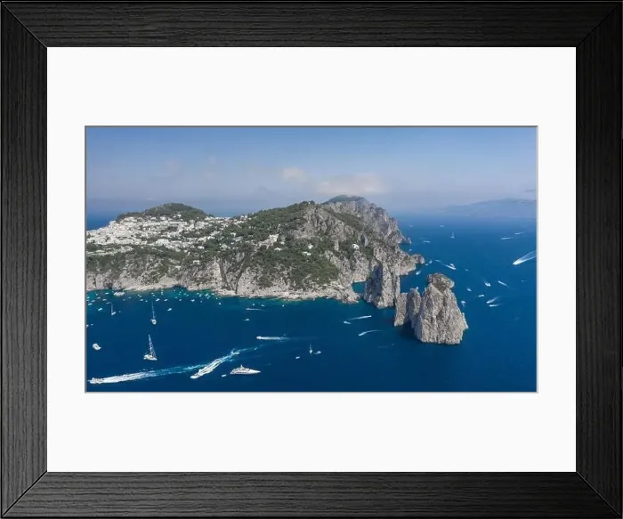 Framed Print : Aerial drone shot view of southern coastline of Capri Islan in Tyrrhenian sea with yachts Framed Print : Aerial drone shot view of southern coastline of Capri Islan in Tyrrhenian sea with yachts
