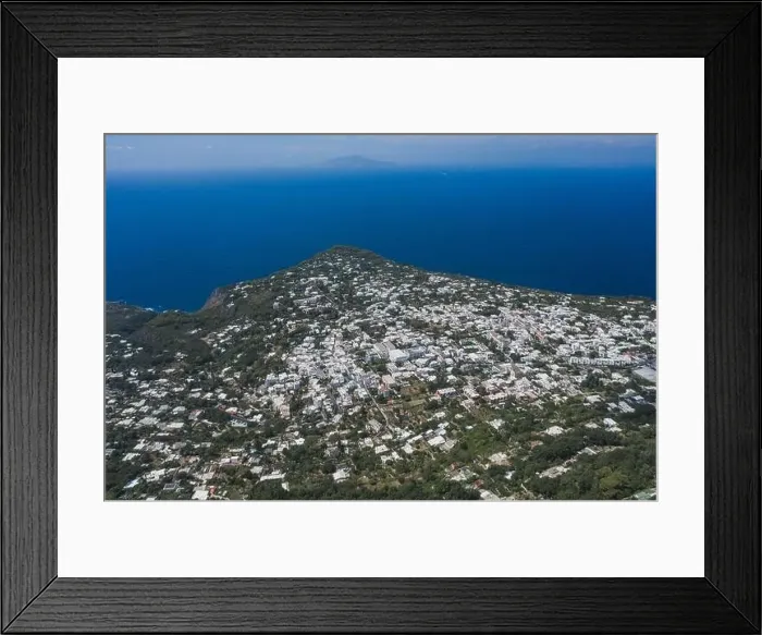 Framed Print : Aerial drone shot view of Anacapri village on Capri Island in Tyrrhenian sea in summer Framed Print : Aerial drone shot view of Anacapri village on Capri Island in Tyrrhenian sea in summer