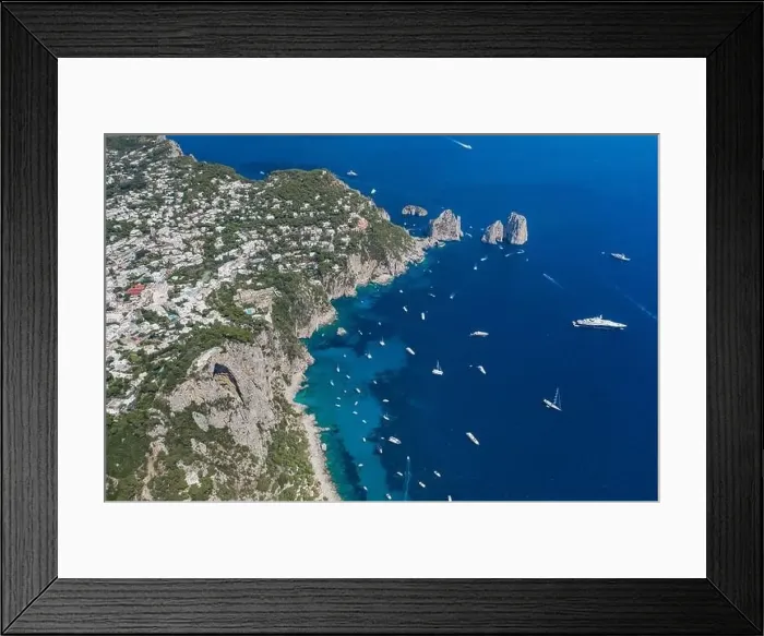 Framed Print : Aerial drone shot of south Capri coastline with faraglioni crag with luxury yachts in Tyrrhenian sea Framed Print : Aerial drone shot of south Capri coastline with faraglioni crag with luxury yachts in Tyrrhenian sea