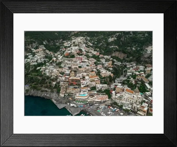 Framed Print : Aerial drone shot view of Positano village and beach in the morning in Amalfi Coast, Salerno Framed Print : Aerial drone shot view of Positano village and beach in the morning in Amalfi Coast, Salerno