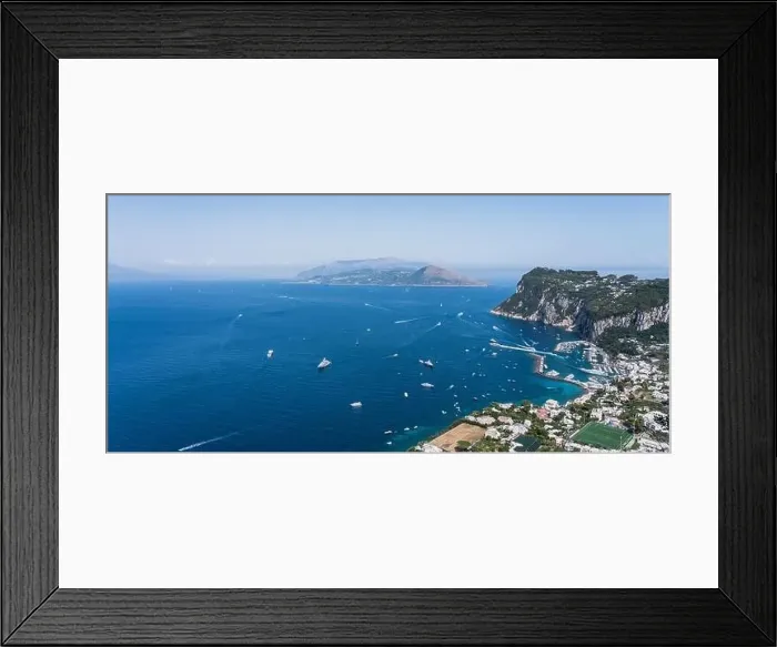 Framed Print : Panoramic view of northen Capri Island Coastline and Marina Grande habour in Tyrrhenian sea and Torrento Peninsula Framed Print : Panoramic view of northen Capri Island Coastline and Marina Grande habour in Tyrrhenian sea and Torrento Peninsula