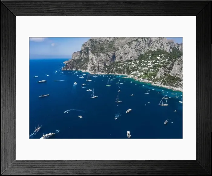 Framed Print : Aerial drone shot view of southern coastline of Capri Islan in Tyrrhenian sea with luxury yachts Framed Print : Aerial drone shot view of southern coastline of Capri Islan in Tyrrhenian sea with luxury yachts