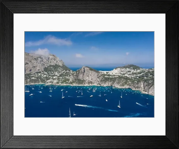 Framed Print : Aerial drone shot view of southern coastline of Capri Islan in Tyrrhenian sea with yachts Framed Print : Aerial drone shot view of southern coastline of Capri Islan in Tyrrhenian sea with yachts