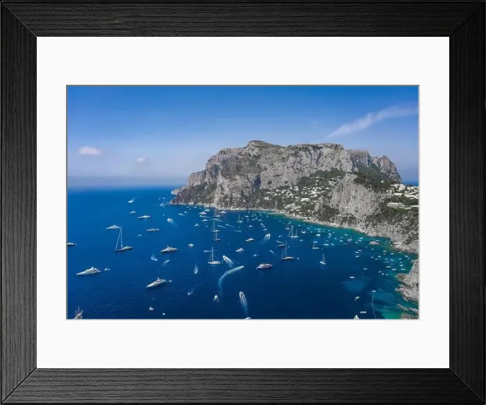 Framed Print : Aerial drone shot view of southern coastline of Capri Islan in Tyrrhenian sea with yachts Framed Print : Aerial drone shot view of southern coastline of Capri Islan in Tyrrhenian sea with yachts