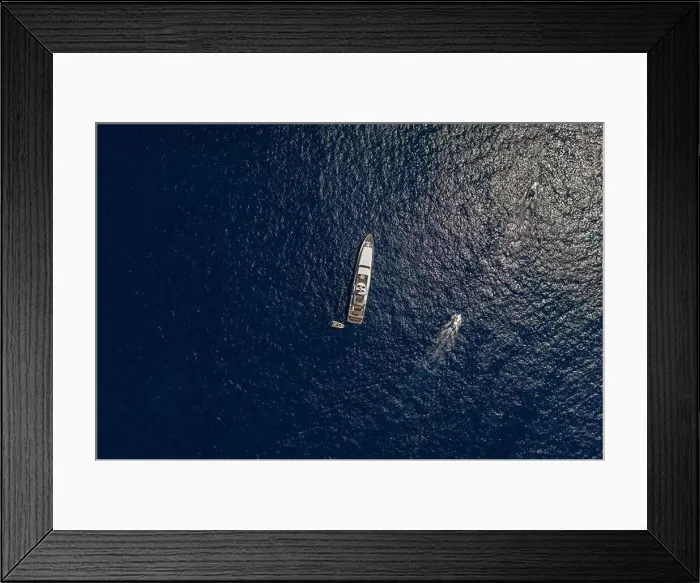Framed Print : Aerial overhead drone shot of luxury yacht in Tyrrhenian sea near Capri Island in summer Framed Print : Aerial overhead drone shot of luxury yacht in Tyrrhenian sea near Capri Island in summer