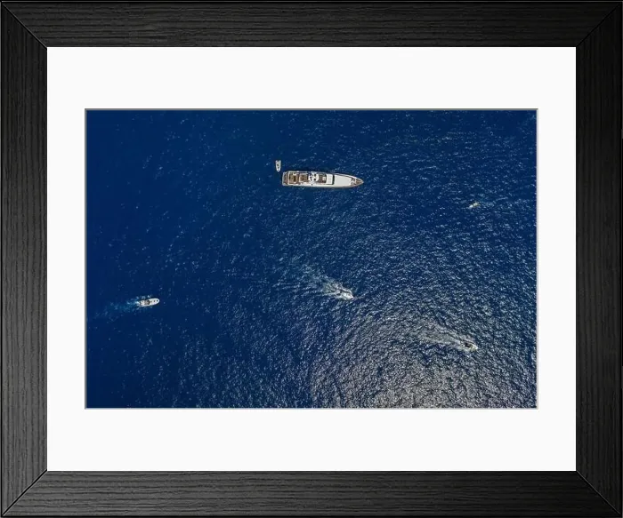 Framed Print : Aerial overhead drone shot of luxury yacht in Tyrrhenian sea near Capri Island in summer Framed Print : Aerial overhead drone shot of luxury yacht in Tyrrhenian sea near Capri Island in summer