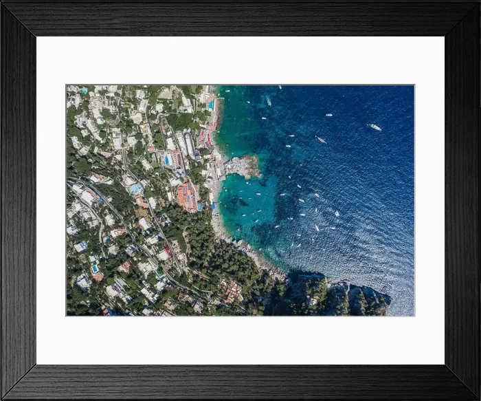 Framed Print : Aerial overhead drone shot of southern Capri Island coastline with yachts in summer noon Framed Print : Aerial overhead drone shot of southern Capri Island coastline with yachts in summer noon