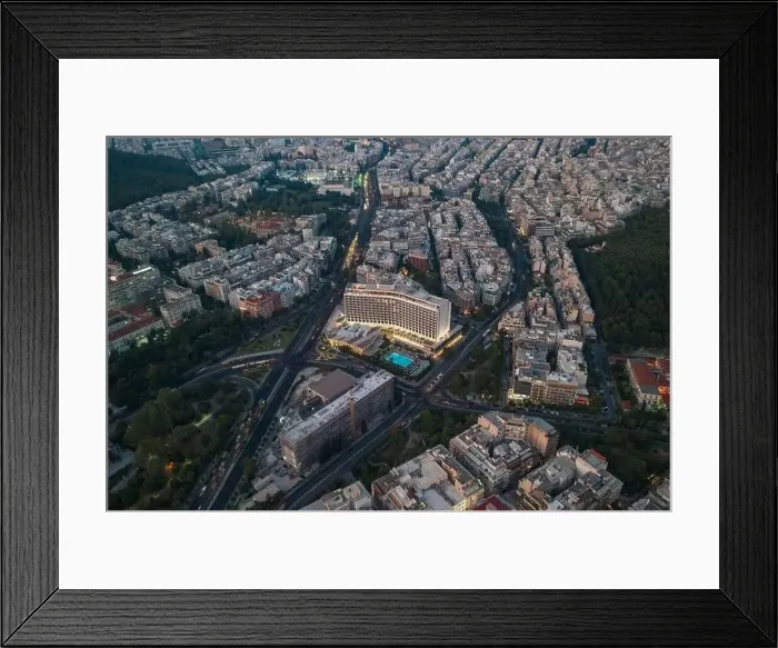 Framed Print : Athens, Greece - August 16, 2019: Aerial drone shot of Hilton Athens hotel with pool in dusk time Framed Print : Athens, Greece - August 16, 2019: Aerial drone shot of Hilton Athens hotel with pool in dusk time