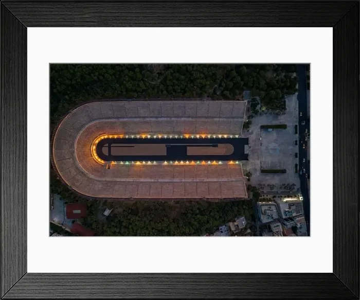 Framed Print : Overhead aerial drone shot of Panathenaic marble stadium with lights in dusk Pangrati, Athens Framed Print : Overhead aerial drone shot of Panathenaic marble stadium with lights in dusk Pangrati, Athens