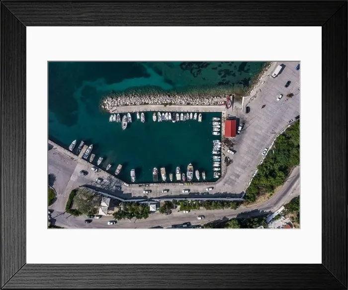 Framed Print : Aerial overhead drone shot of boats at Poros Harbour on Kefalonia Island in Greece Framed Print : Aerial overhead drone shot of boats at Poros Harbour on Kefalonia Island in Greece