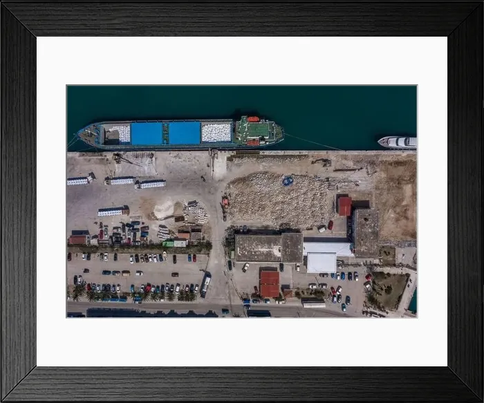 Framed Print : Aerial overhead drone shot of cargo ship in Argostolion town harbour on Kefalonia Island Framed Print : Aerial overhead drone shot of cargo ship in Argostolion town harbour on Kefalonia Island