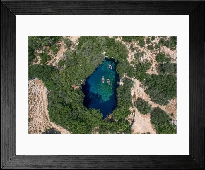 Framed Print : Aerial overhead drone shot of tourists boat in subterranean Melissani Lake Cave in Kefalonia Island Framed Print : Aerial overhead drone shot of tourists boat in subterranean Melissani Lake Cave in Kefalonia Island