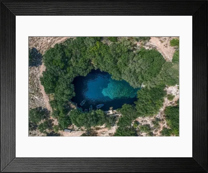 Framed Print : Aerial overhead drone shot of tourists boat in subterranean Melissani Lake Cave in Kefalonia Island Framed Print : Aerial overhead drone shot of tourists boat in subterranean Melissani Lake Cave in Kefalonia Island