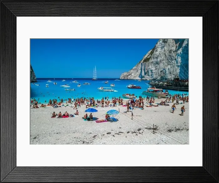 Framed Print : Zakynthos, Greece - August 20, 2019: Aerial drone shot of tourists on Zakynthos Shipwreck Navagio beach Framed Print : Zakynthos, Greece - August 20, 2019: Aerial drone shot of tourists on Zakynthos Shipwreck Navagio beach