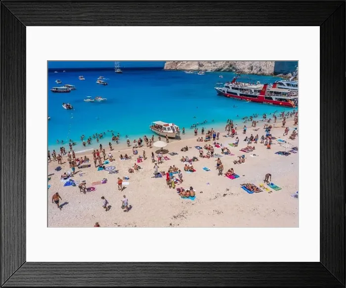 Framed Print : Zakynthos, Greece - August 20, 2019: Aerial drone shot of tourists on Zakynthos Shipwreck Navagio beach Framed Print : Zakynthos, Greece - August 20, 2019: Aerial drone shot of tourists on Zakynthos Shipwreck Navagio beach