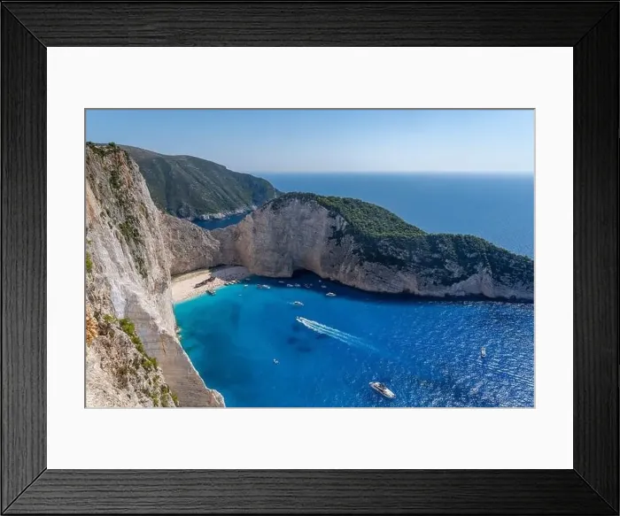 Framed Print : Zakynthos Shipwreck Navagio beach cove with luxury yachts view from cliff observation view point Framed Print : Zakynthos Shipwreck Navagio beach cove with luxury yachts view from cliff observation view point