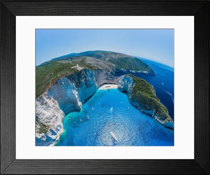 Framed Print : Aerial panorama drone shot of Zakynthos Navagio beach with cliffs and yachts in Ionian sea Framed Print : Aerial panorama drone shot of Zakynthos Navagio beach with cliffs and yachts in Ionian sea