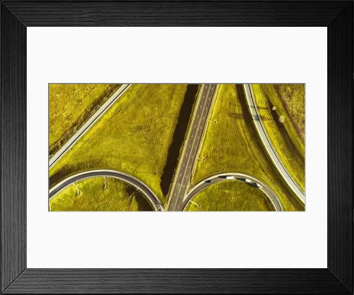 Framed Print : Drone view of morning empty country side road with beautiful green landscape around Framed Print : Drone view of morning empty country side road with beautiful green landscape around