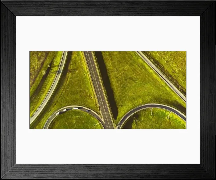 Framed Print : Drone view of morning empty country side road with beautiful green landscape around Framed Print : Drone view of morning empty country side road with beautiful green landscape around