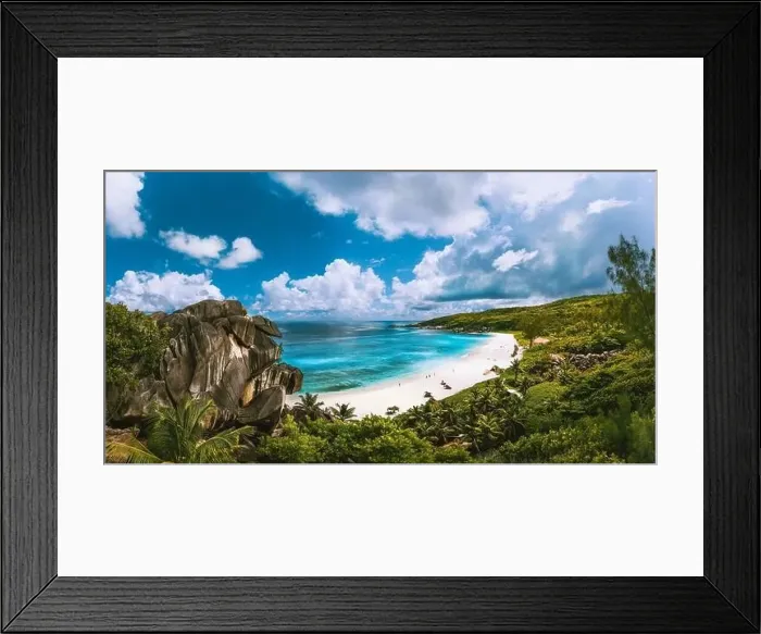 Framed Print : Panoramic view of beautiful Grand Anse beach on La Digue island in Seychelles. Blue lagoon with white clouds above Framed Print : Panoramic view of beautiful Grand Anse beach on La Digue island in Seychelles. Blue lagoon with white clouds above