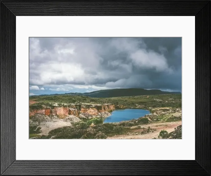 Framed Print : Heavy rain over a former large quarry in Minas Gerais state in Brazil Framed Print : Heavy rain over a former large quarry in Minas Gerais state in Brazil