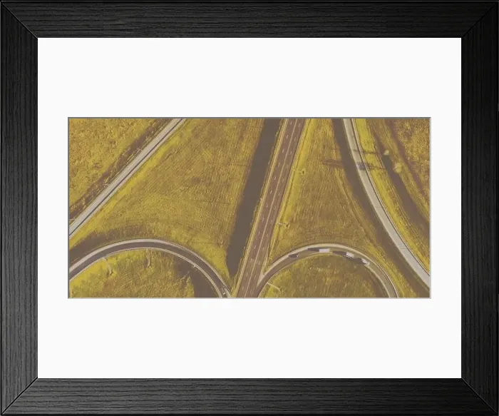 Framed Print : Drone view of morning empty country side road with beautiful green landscape around Framed Print : Drone view of morning empty country side road with beautiful green landscape around