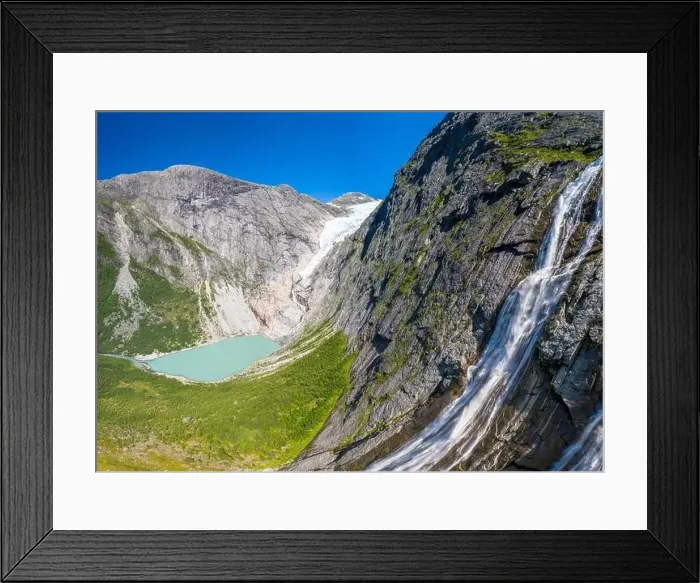 Framed Print : Aerial panoramic by drone of waterfall above Briksdalsbreen glacier Framed Print : Aerial panoramic by drone of waterfall above Briksdalsbreen glacier