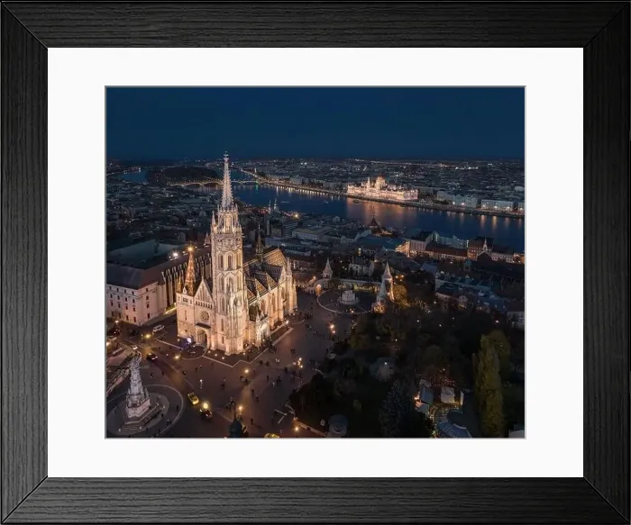 Framed Print : Budapest, Hungary - Aerial drone view of the beautiful illuminated Matthias Church at blue hour with Fisherman's Framed Print : Budapest, Hungary - Aerial drone view of the beautiful illuminated Matthias Church at blue hour with Fisherman's