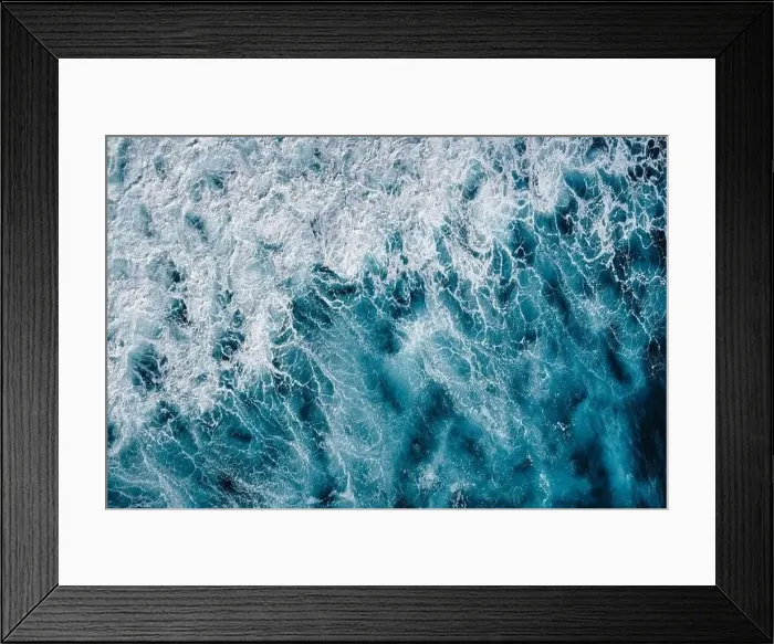 Framed Print : Aerial view to seething waves with foam. Waves of the sea meet each other during high tide and low tide Framed Print : Aerial view to seething waves with foam. Waves of the sea meet each other during high tide and low tide