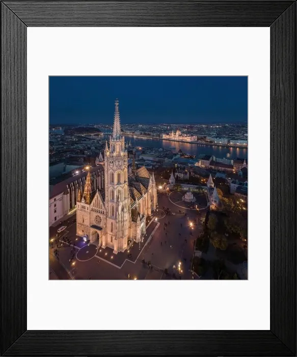 Framed Print : Budapest, Hungary - Aerial drone view of the beautiful illuminated Matthias Church at blue hour with Fisherman's Framed Print : Budapest, Hungary - Aerial drone view of the beautiful illuminated Matthias Church at blue hour with Fisherman's