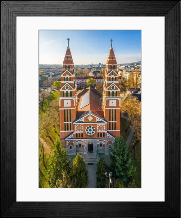 Framed Print : Budapest, Hungary - Aerial drone view of the Saint Michael's Parish Church on an autumn morning with clear blue sky Framed Print : Budapest, Hungary - Aerial drone view of the Saint Michael's Parish Church on an autumn morning with clear blue sky