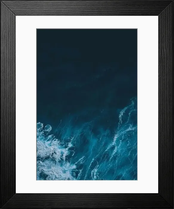 Framed Print : Aerial view to sea landscape, water with waves and rocks. Dramatic colors photo. Image with place for text Framed Print : Aerial view to sea landscape, water with waves and rocks. Dramatic colors photo. Image with place for text
